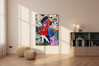 Banksy-style graffiti art of a couple kissing, vibrant colors, on a canvas in a modern living room.