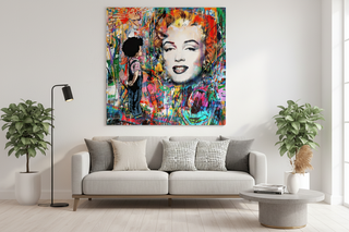 Vibrant Marilyn Pop Art on canvas, featuring a colorful graffiti style, above a modern gray sofa.